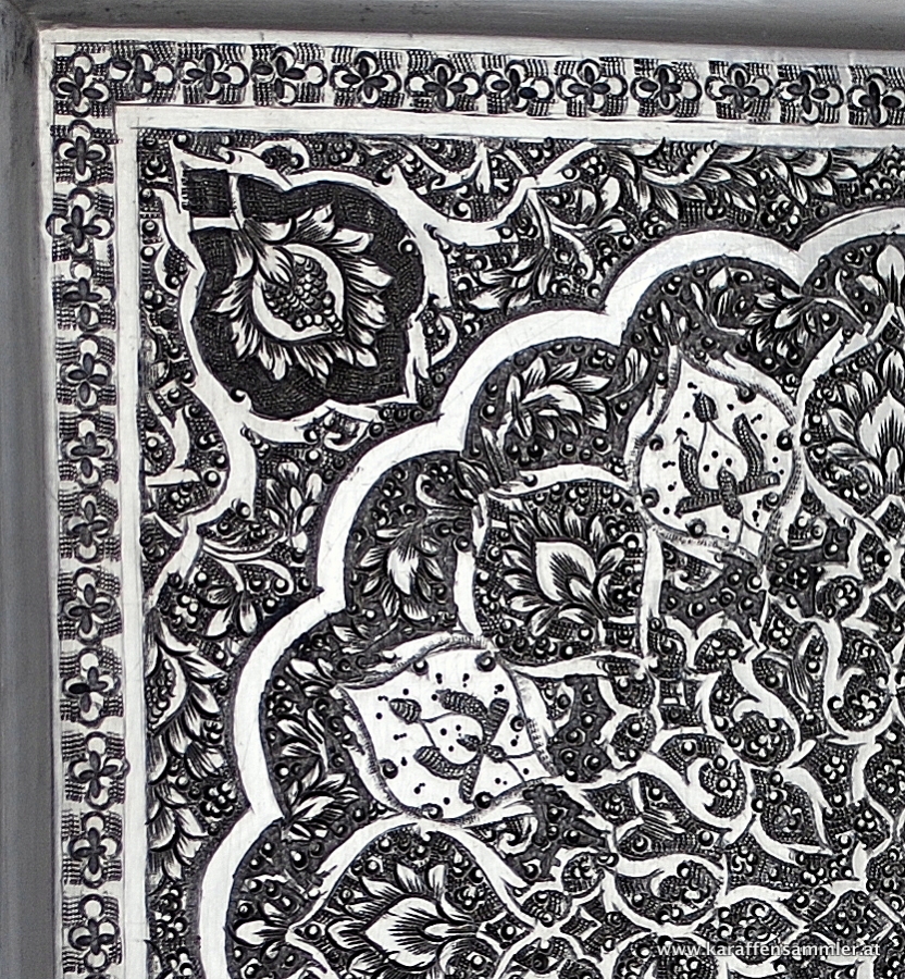 details of finely engraved decoration