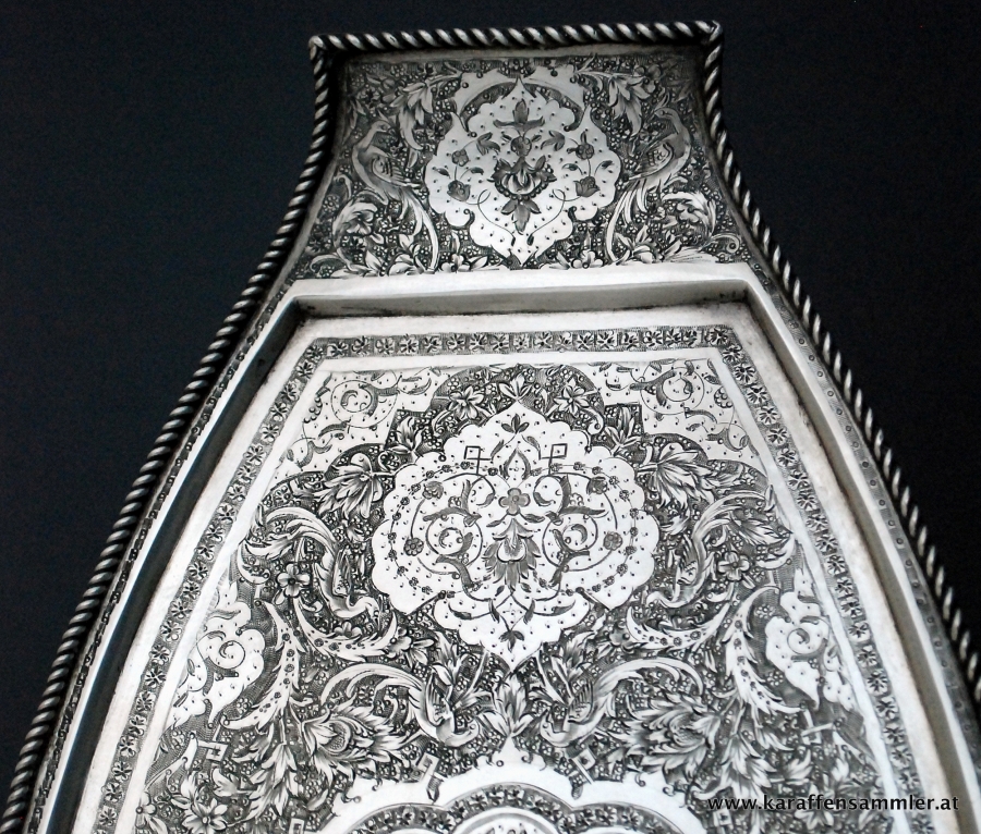 details of finely engraved decoration