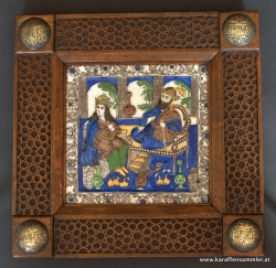 Persian qajar tile in carved frame with calligraphy brass plaques